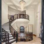 The center of the home features a massive spiraling staircase (Screenshot from Redfin website)