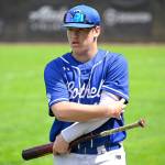 Max Paterson (#3) stretches before batting. Courtesy of Patrick Krohn.