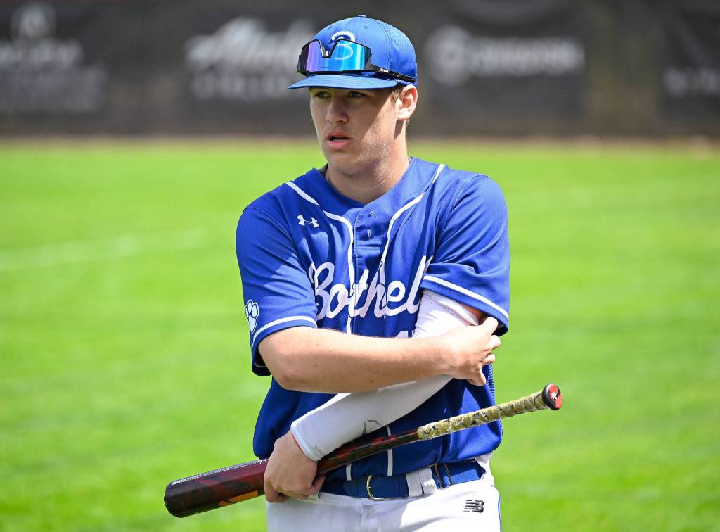 Max Paterson (#3) stretches before batting. Courtesy of Patrick Krohn.