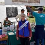 Fall City Days 2022 Grand Marshal Ruth Pickering poses in front of the Fall City Historical Society tent. Read all about Pickering and her contributions to Fall City at bit.ly/3tvSDVO.