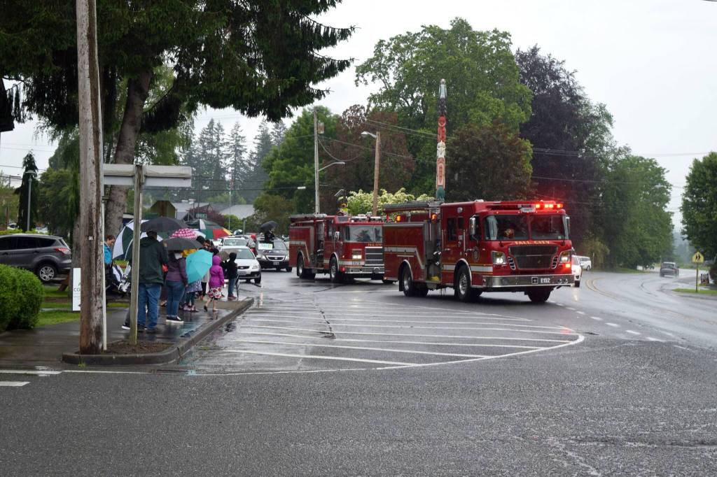 Fire Trucks start the Fall City Graduate Parade on June 17. Photo Conor Wilson/Valley Record.