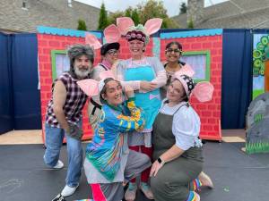 Photo courtesy of Julie Lester 
The cast for Valley Center Stages production of Three Little Pigs after a performance at Si View Park.