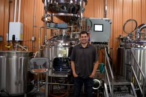 Nathan Sherfey, Remlinger Farms General Manager, poses in the new, onsite brewery. The brewery is open 12 to 8 p.m. Wednesday through Sunday at 32510 N.E. 32nd Street in Carnation. Photo by Conor Wilson/ Valley Record.