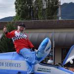 A man gives a thumbs up to the crowd during the Festival at Mt. Si Parade. Photo Conor Wilson/Valley Record.