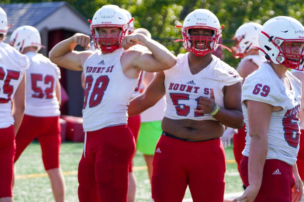 Henry Shrum Spiekermann (l) and Jayden Wells pose for the camera at practice on Aug. 17. Photo by Conor Laffey/SVSD.
