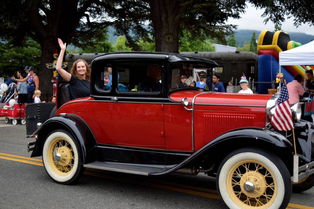 A classic car drives by during the Snoqualmie Days Grand Parade. Photo Conor Wilson/Valley Record.