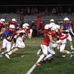 Photo Courtesy of Calder Productions 
Junior Running Back Beau Phillips (22) breaks a tackle in Mount Sis Scarlet and Gray game on Aug. 26.