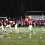 Senior Quarterback Cyrus Turley throws a pass in an inter-squad game on Aug. 26. Photo Courtesy of Calder Productions