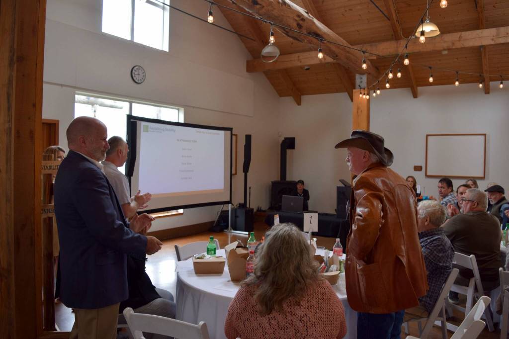 Founding members of Snoqualmie Shelter stand for recognition. Photo Conor Wilson/Valley Record.
