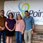 CarePoint Clinic and Snoqualmie Valley Alliance Church staff pose for a photo outside their clinic. From left: SVA Lead Pastor Baly Botten, Opperations Manager Misty Messer, Executive Director Tami Jones, Medical Director Todd Wright. Photo Conor Wilson/Valley Record.