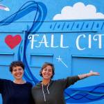 Artists Krimsey Lilleth (right) and Jess Joy stand in front of their mural. Photo courtesy of Krimsey Lilleth