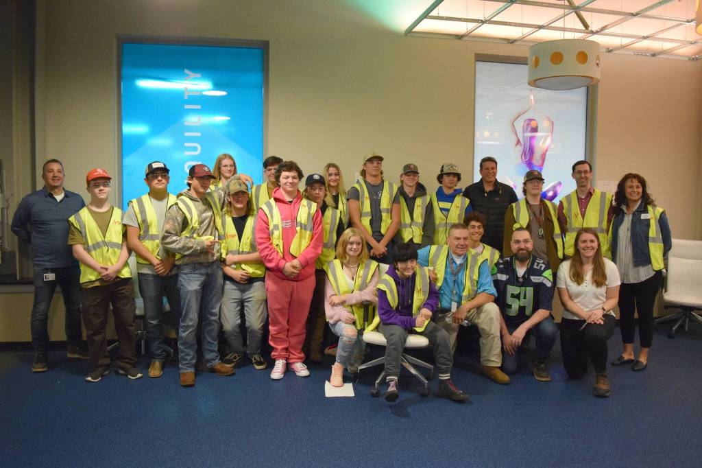 Mount Si CTE students pose for a group photo at Technical Glass Products in Snoqualmie. Photo by Conor Wilson/Valley Record