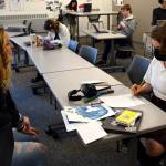 Conor Wilson / Valley Record.
Sarah Hughes speaks with a student at Two Rivers High School.