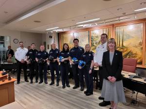 The City of Snoqualmie welcomes six new volunteer firefighters to its department. From left: Snoqualmie Fire Chief Correira, David Hazelton, Kyle Liston, Alex Wolfe, Katie Anthony, Nicko Chaves, Mary Beinner, Snoqualmie Fire Deputy Chief Mike Bailey, Mayor Katherine Ross. Photo Courtesy of the City of Snoqualmie.