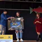 Perry Falcone (left) receives a gift from the Snoqualmie Tribe. Photo by Conor Wilson/Valley Record