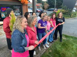 Tahvia Bridgman, owner of Vintage Baristas, celebrates the grand opening of their new location with team members on Oct. 12. Photo Courtesy of the SnoValley Chamber of Commerce.