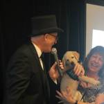 Larry Snyder, left, looks at Clark Roberts new guide dog-in-training. Photo by Conor Wilson/Valley Record
