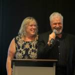 Clark and Karrie Roberts, behind Valley-based nonprofit Ultimate Vision, speak at the opening of the Seeing & Sharing the Heart of Kindness Gala on Oct. 16 at the Hilton Garden Inn in Issaquah. Photo by Conor Wilson/Valley Record