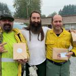 Three firefighters from Methow Valley supporting wildfire fighting efforts outside Snoqualmie receive lunch from Snoqualmie Casino employees. Photo courtesy of Tarah Smigun.
