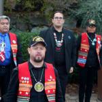 Josh Fackrell (front), an Army Veteran and Snoqualmie Tribal member, leads the Tribes Honor Guard in a flag ceremony outside the casino.
