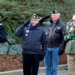 Veterans salute the flag at the Snoqualmie Casino on Nov. 11 during a singing of the national anthem. All photos Conor Wilson/Valley Record.