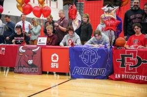 Photo Courtesy of the Snoqualmie Valley School District
Twelve Mount Si High School student-athletes sign National Letters of Intent or signing forms to play collegiate sports at ceremony on Nov. 17.