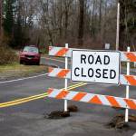 City of Snoqualmie closes Mill Pond road after a fallen tree rests on power lines. Photo Conor Wilson/Valley Record.