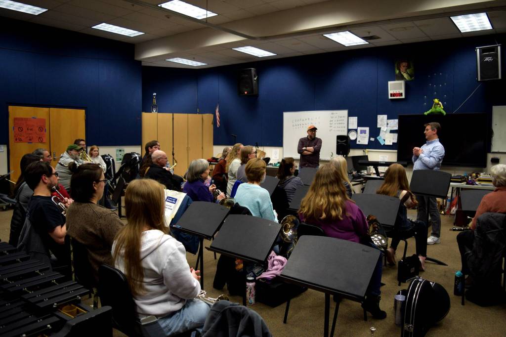 Band Director Mike Herb and Dean Snavely speak to members of the SnoValley Winds band before its first rehearsal. Photos by Conor Wilson/Valley Record