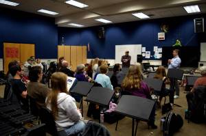 Band Director Mike Herb and Dean Snavely speak to members of the SnoValley Winds band before its first rehearsal. Photos by Conor Wilson/Valley Record