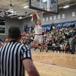 Mount Si Senior Miles Heide dunks the ball in the KingCo League championship game against Skyline on Feb. 4. Photo courtesy of Calder Productions.
