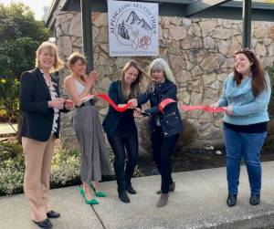 Dr. Erika Peschel (center), owner of Alpenglow Aesthetique, holds a ribbon cutting ceremony for her new business on March 16. She is joined by SnoValley Chamber CEO Kelly Coughlin (right) and Snoqualmie Mayor Katherine Ross (left). Alpenglow Aesthetique is located near Downtown Snoqualmie at 38700 Southeast River Street, Suite 300. Photo William Shaw/Valley Record.