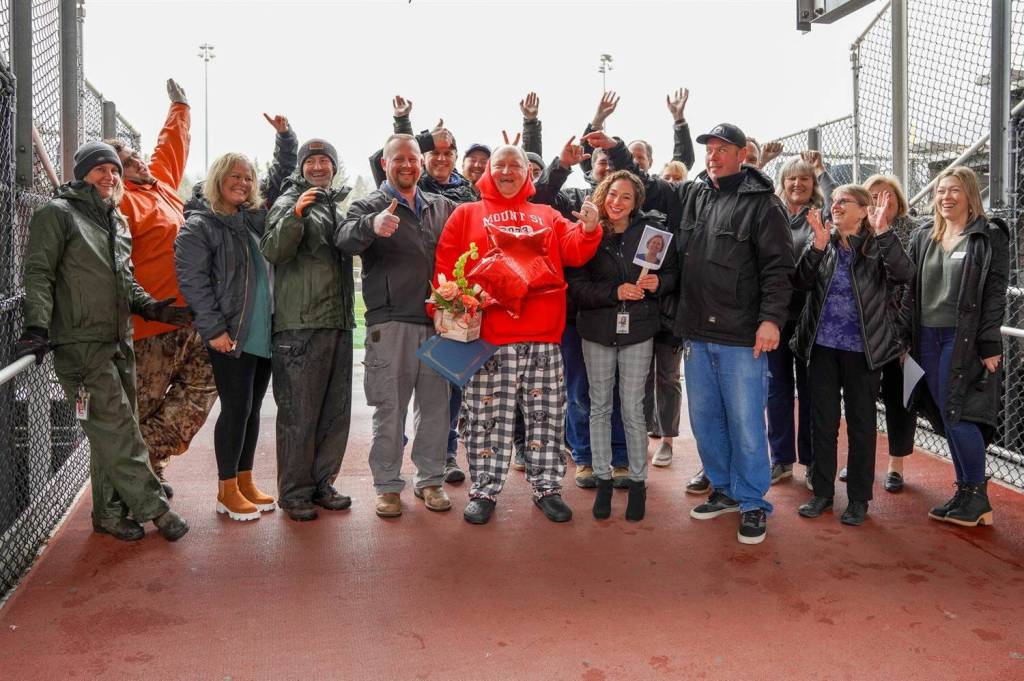 Mount Si Maintenance/Stadium worker Doron Jones (center). Photo courtesy of Snoqualmie Valley School District.