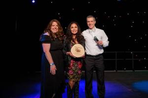 Debbie Zaragoza (middle) owner of Infusion Bar and Grill poses with SnoValley Chamber CEO Kelly Coughlin (left) and Chamber Board President Michael Hughes. Courtesy photo/Veronica Frost Photography