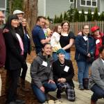 Some of the new homeowners at Tyler Town in North Bend pose for a group photo with Habitat for Humanity staff. Photos by Conor Wilson/Valley Record