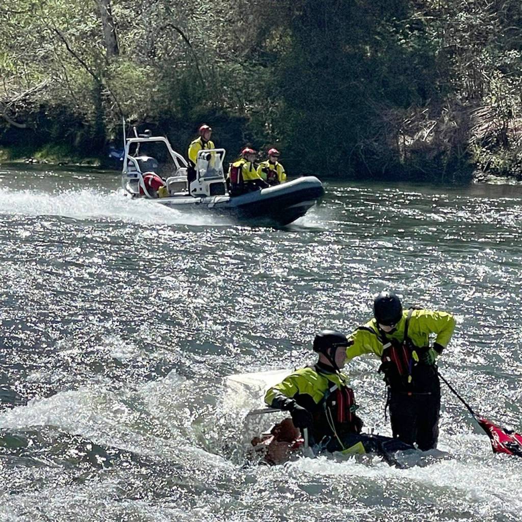 Firefighters train on the Snoqualmie River for river rescues, including the search a partially submerged training prop vehicle. COURTESY PHOTO, Puget Sound Fire