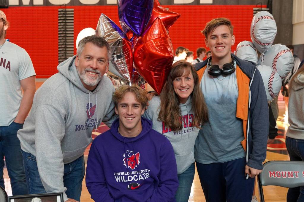 Liam Christensen will play football football and run track at Linfield University.