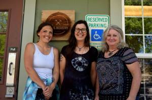 Photos by Conor Wilson/Valley Record.
Members of North Bend Art & Industry pose for a photo outside their new space in downtown North Bend. From left: Sarah Hughes, Ellen Rowan, Deb Landers.