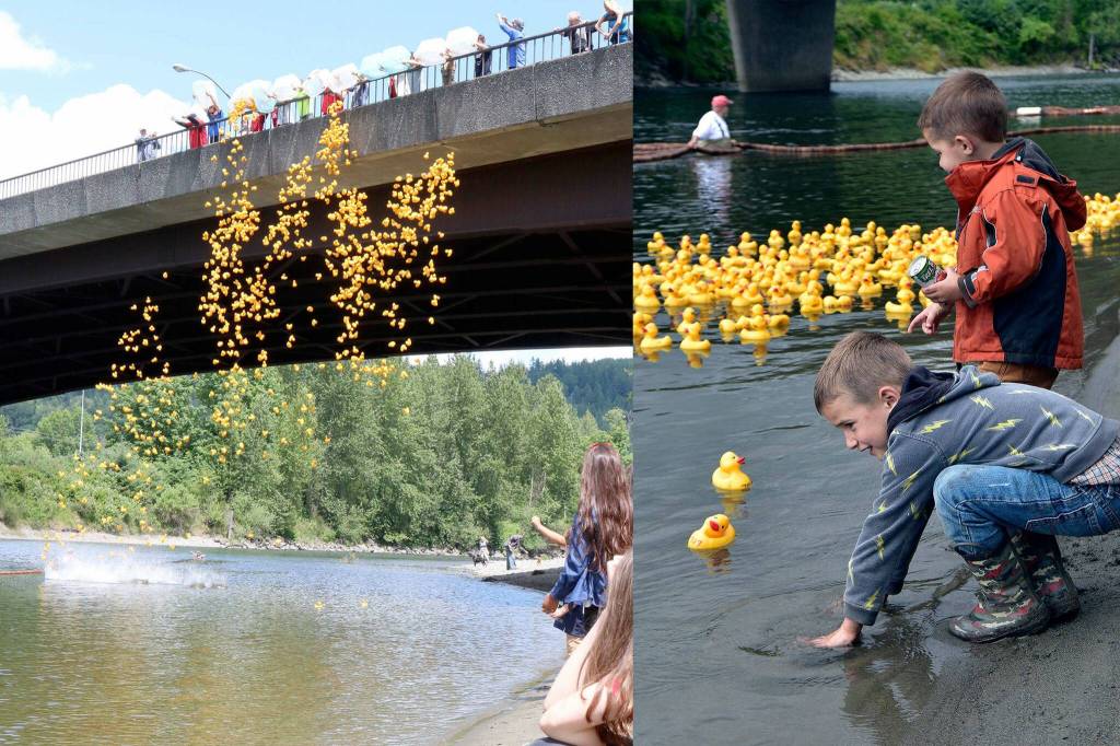 Left: 1,000 ducks being thrown in the Snoqualmie River in 2019. Right: Duck Derby fans watch near the finish line. File photos Evan Pappas & Carol Ladwig.