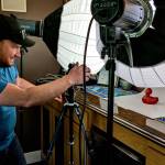 Local photographer Jason Refsland snaps a photo of each duck.