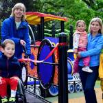 Snoqualmie Mayor Katherine Ross (left) and Councilmember Cara Christensen celebrate the opening of Riverview Park playground on June 9. Photo Conor Wilson/Valley Record.