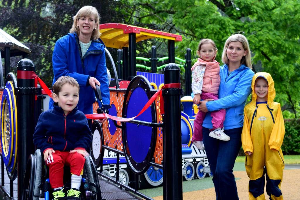 Snoqualmie Mayor Katherine Ross (left) and Councilmember Cara Christensen celebrate the opening of Riverview Park playground on June 9. Photo Conor Wilson/Valley Record.
