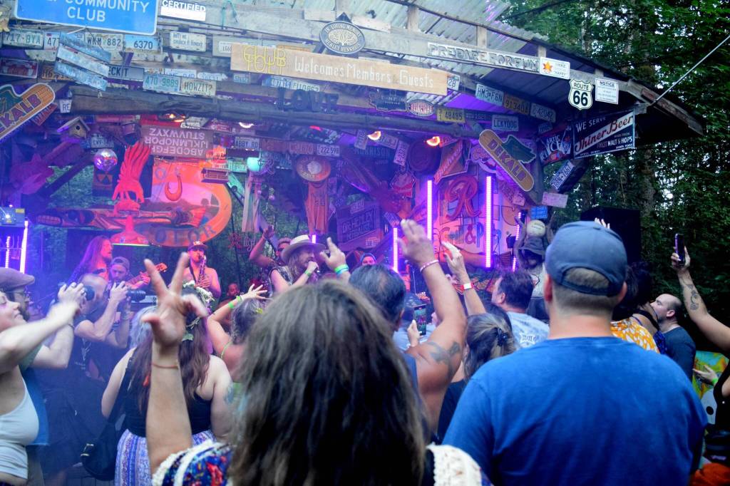 Rapper Torin Frost hopes on stage with the Marshall Law Band.