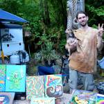 Artist James McNulty (@uncommonculturejames) poses with his work.