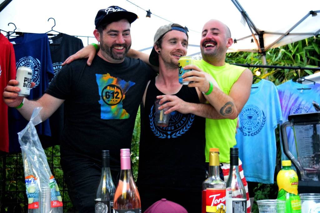 Chris Heigyde (l) and Danny Scott (center), founders of the International Drinking Team.