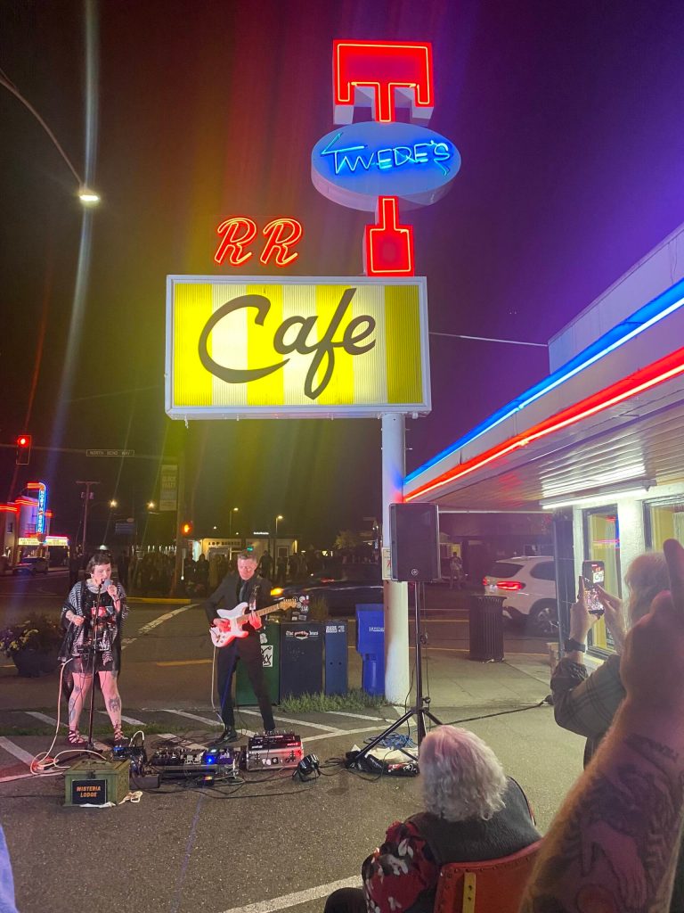 Wisteria Lodge plays during the unveiling of the RR sign at Twedes Cafe on Aug. 28. Photo courtesy of Jeannie Bowers.