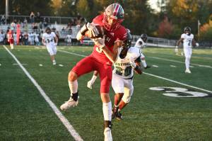 Photo courtesy of Calder Productions. Senior Jack Taylor hauls in a reception.
