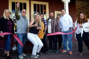 Photo by Conor Wilson/Valley Record
North Bend Downtown Foundation Board members celebrate the foundations new office at the North Bend Train Depot on Sept. 21. Pictured from left: Suzan Torguson, North Bend Mayor Rob McFarland, Foundation Executive Director Jessica Self, Britni Larson, Lucas Haines, Beth Burrows (back) Jason Glazier, SnoValley Chamber CEO Kelly Coughlin.