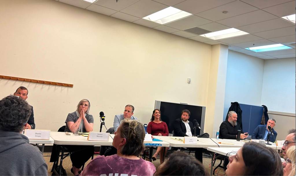 Seven candidates gather to answer questions at Sno-Valley Senior Center on Sept. 25. From left to right: Dustin Green, Jessica Merizan, Ryan Burrell, Adair Hawkins, Brodie Nelson, Max Voelker and Tim Harris. (Photo by Cameron Sires/Sound Publishing)