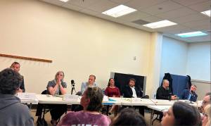 Seven candidates gather to answer questions at Sno-Valley Senior Center on Sept. 25. From left to right: Dustin Green, Jessica Merizan, Ryan Burrell, Adair Hawkins, Brodie Nelson, Max Voelker and Tim Harris. (Photo by Cameron Sires/Sound Publishing)