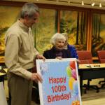 Gloria McNeely stands next former Mayor Matt Larson as she celebrates her 100th birthday at Snoqualmie City Hall. File photo